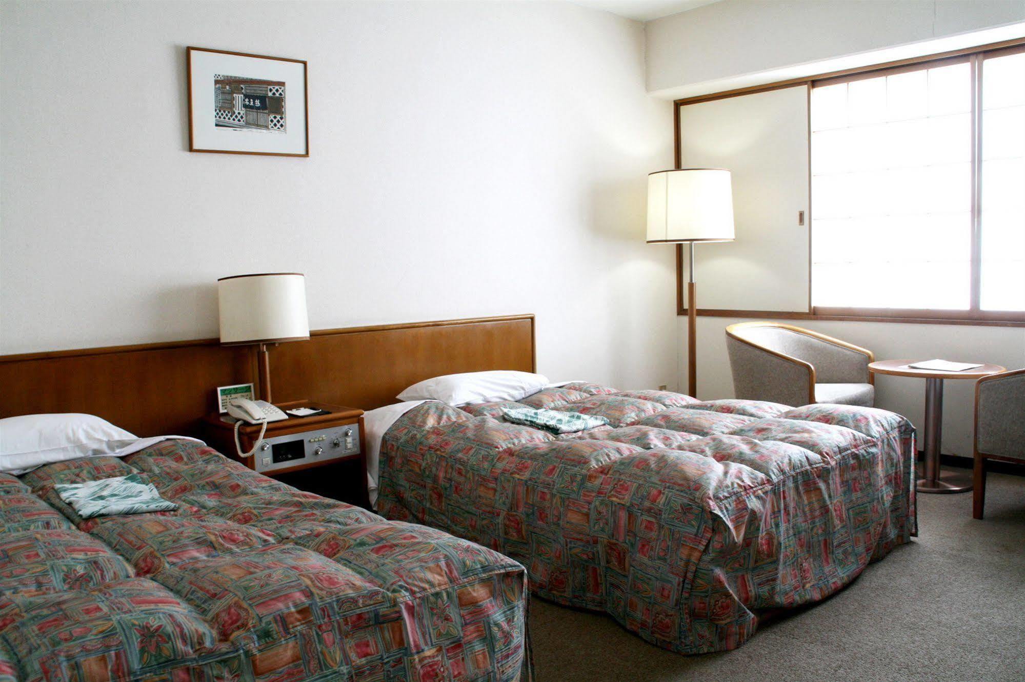 Green Hill Hotel อากาชิ ภายนอก รูปภาพ